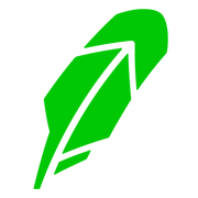 a green feather on a black background